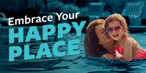 A mother and daughter in a pool