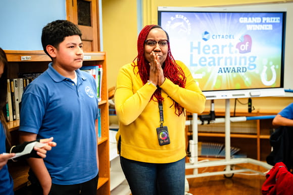 A 2025 CHOLA winner receiving her award