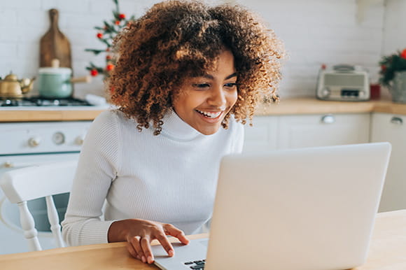 Woman working at a laptop