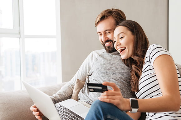 Couple working on a laptop