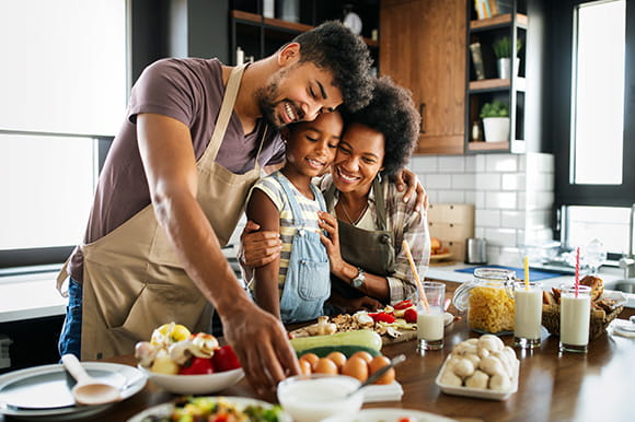 Family cooking dinner together