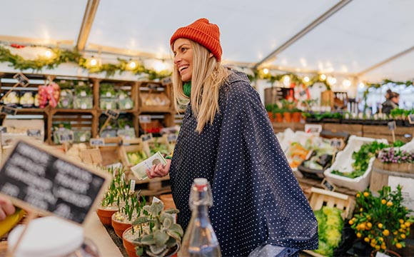 woman shopping in winter hat
