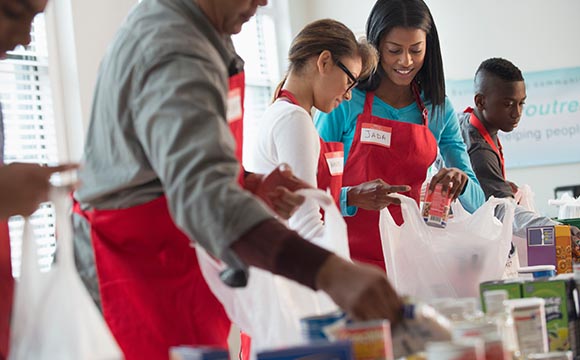 people volunteering at can drive