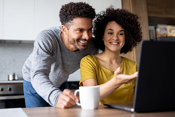 Couple working at a computer